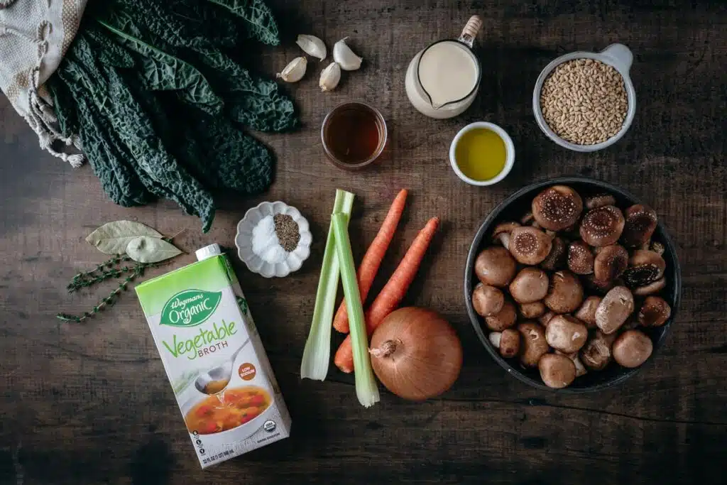 overhead shot of ingredients for mushroom, barley soup